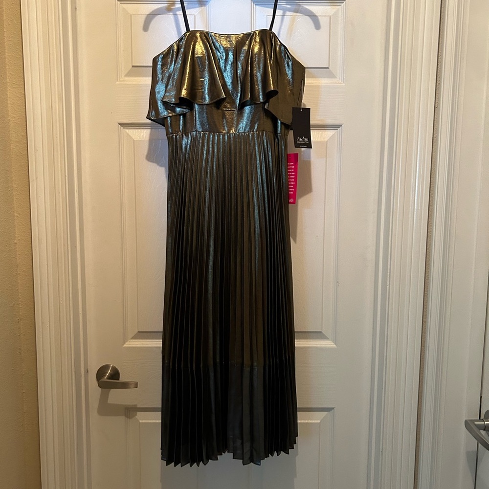 Never worn. Size 6 Aidan Maddox